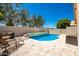 Inviting swimming pool with surrounding patio and lounge chairs at 1762 S Saddle St, Gilbert, AZ 85233