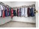 Large walk-in closet with ample shelving and hanging space at 1762 S Saddle St, Gilbert, AZ 85233