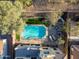 Aerial view of house with pool and landscaped backyard at 17673 W Agave Rd, Goodyear, AZ 85338