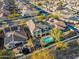 Aerial view of house with pool in residential neighborhood at 17673 W Agave Rd, Goodyear, AZ 85338