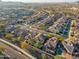 Aerial view showcasing house and surrounding neighborhood at 17673 W Agave Rd, Goodyear, AZ 85338