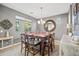 Elegant dining room featuring a wood table and decorative sideboard at 17673 W Agave Rd, Goodyear, AZ 85338