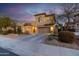 Two-story home with attached garage and desert landscaping at 17673 W Agave Rd, Goodyear, AZ 85338