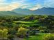 Golf course with mountain backdrop at 17673 W Agave Rd, Goodyear, AZ 85338