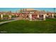 Community playground with covered play area at 17673 W Agave Rd, Goodyear, AZ 85338