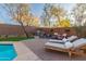 Relaxing pool area with patio furniture at 17673 W Agave Rd, Goodyear, AZ 85338