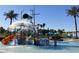 Community waterpark featuring a water playground and slides at 17673 W Agave Rd, Goodyear, AZ 85338