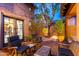 Private backyard oasis with comfortable seating and lush landscaping at 17918 N 95Th St, Scottsdale, AZ 85255