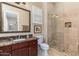 Elegant bathroom with marble vanity and walk-in shower at 17918 N 95Th St, Scottsdale, AZ 85255