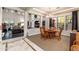 Spacious dining area with a view into the living room and kitchen at 17918 N 95Th St, Scottsdale, AZ 85255