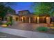 Beautiful home exterior with a two-car garage and landscaping at 17918 N 95Th St, Scottsdale, AZ 85255