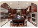 Modern kitchen with a large island and stainless steel appliances at 17918 N 95Th St, Scottsdale, AZ 85255