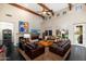 Bright living room with hardwood floors and a cozy seating area at 17918 N 95Th St, Scottsdale, AZ 85255