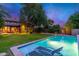 Expansive swimming pool and lounge chairs in a backyard setting at 17918 N 95Th St, Scottsdale, AZ 85255