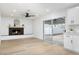 Living room with fireplace, hardwood floors and sliding glass doors at 2074 E Dunbar Dr, Tempe, AZ 85282