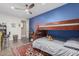 Cozy bedroom featuring a bunk bed and blue walls at 2213 W Twain Dr, Anthem, AZ 85086