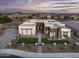 Luxury home with solar panels, spacious yard, and modern design, in a Gathering-friendly neighborhood at 23311 N 95Th Dr, Peoria, AZ 85383