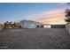 Spacious backyard with gravel landscaping and gated entry at 23311 N 95Th Dr, Peoria, AZ 85383