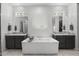 Spa-like bathroom with double vanity and large tub at 23311 N 95Th Dr, Peoria, AZ 85383
