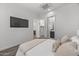 Spacious bedroom with a queen-size bed and en-suite closet at 23311 N 95Th Dr, Peoria, AZ 85383