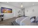 Spacious primary bedroom with large TV and sitting area at 23311 N 95Th Dr, Peoria, AZ 85383