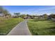 Enjoy a stroll along this paved pathway through the community at 23311 N 95Th Dr, Peoria, AZ 85383