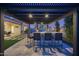 Pergola with outdoor kitchen and seating area at 23311 N 95Th Dr, Peoria, AZ 85383