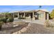 Spacious backyard with stone pathway and golf course views at 24831 S Ribbonwood Dr, Sun Lakes, AZ 85248