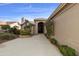 Front entry with walkway, landscaping and a double door entry at 24831 S Ribbonwood Dr, Sun Lakes, AZ 85248