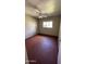 Simple bedroom with ceiling fan and tile flooring at 2945 N 19Th Ave # 67, Phoenix, AZ 85015