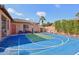 Outdoor basketball court with surrounding landscaping at 351 N Cloverfield Cir, Litchfield Park, AZ 85340