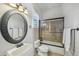 Clean bathroom with a tub and shower combo and updated fixtures at 351 N Cloverfield Cir, Litchfield Park, AZ 85340