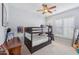 Well-lit bedroom featuring a bunk bed and ample floor space at 351 N Cloverfield Cir, Litchfield Park, AZ 85340