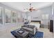 Spacious main bedroom with sitting area and large windows at 351 N Cloverfield Cir, Litchfield Park, AZ 85340