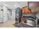 Functional laundry room with stackable washer and dryer at 351 N Cloverfield Cir, Litchfield Park, AZ 85340