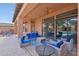 Relaxing patio with seating area overlooking the pool at 351 N Cloverfield Cir, Litchfield Park, AZ 85340