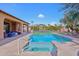 Resort-style pool and spa with seating area at 351 N Cloverfield Cir, Litchfield Park, AZ 85340