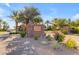 Encanterra community entrance featuring stone and lush landscaping at 35372 N Sunset Trl, Queen Creek, AZ 85140