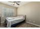 Bright bedroom with carpeted floor and window coverings at 4047 E Erie St # 102, Gilbert, AZ 85295