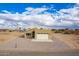 Modern single story home with tan exterior and two car garage at 4145 N Golden St, Eloy, AZ 85131