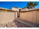 Tan stucco condo building with walkway and landscaping at 4731 W Continental Dr, Glendale, AZ 85308