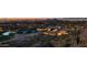 Night aerial view showcasing city lights and resort amenities at 5000 E Camelback Ridge Rd # 408, Scottsdale, AZ 85251