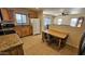 Wood cabinets, granite counters, and stainless steel appliances in this kitchen at 538 S Meridian Rd, Apache Junction, AZ 85120