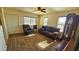 Living room with hardwood floors, a large window, and comfortable seating at 538 S Meridian Rd, Apache Junction, AZ 85120