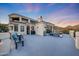 Large rooftop patio with multiple fire pits and seating areas at 6213 W Saguaro Park Ln, Glendale, AZ 85310