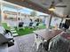 Large backyard with pool, spa, dining area, and games at 8114 E Clarendon Ave, Scottsdale, AZ 85251