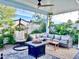 Relaxing backyard patio with fire pit, seating area, and covered pergola at 8114 E Clarendon Ave, Scottsdale, AZ 85251