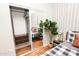 Bedroom with mirrored closet and chevron patterned wall at 8114 E Clarendon Ave, Scottsdale, AZ 85251