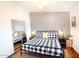 Modern bedroom with geometric patterned wall at 8114 E Clarendon Ave, Scottsdale, AZ 85251