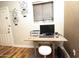 Small home office with a computer, printer, and desk at 8114 E Clarendon Ave, Scottsdale, AZ 85251